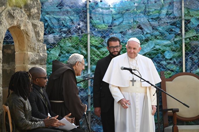 03 April 2022, Malta, Hal Far: Pope Francis visits migrants in a charitable institution as part of his trip to Malta. Photo: Johannes Neudecker/dpa