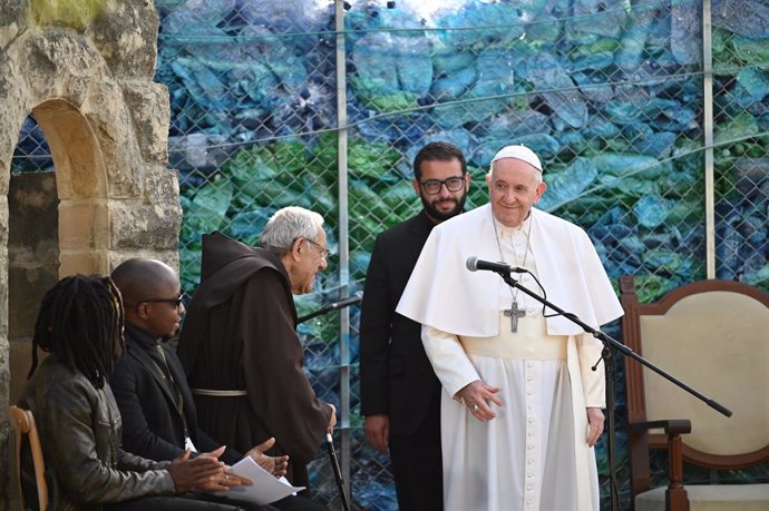 03 April 2022, Malta, Hal Far: Pope Francis visits migrants in a charitable institution as part of his trip to Malta. Photo: Johannes Neudecker/dpa