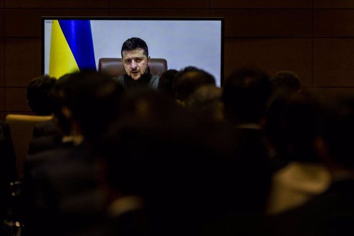 23 March 2022, Japan, Tokyo: Ukrainian President Volodymyr Zelensky addresses Japan's lower house lawmakers via videolink at the House of Representatives office building in Tokyo. Photo: Pool/ZUMA Press Wire/dpa