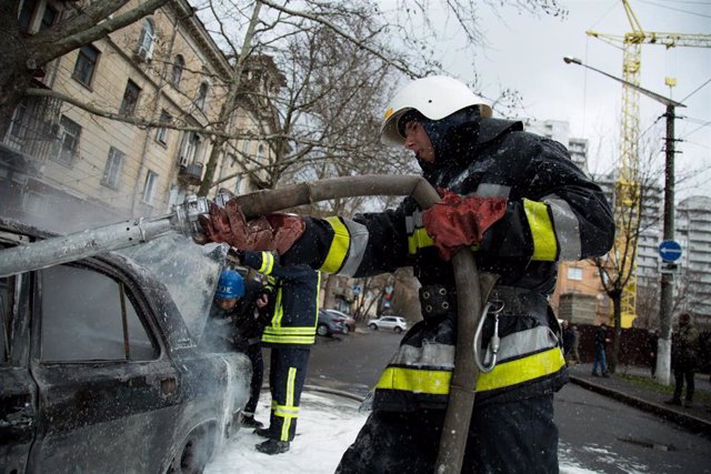 April 3, 2022, Mykolaiv, Ukraine: Mykolaiv, Ukraine. 03 April 2022. A civilian car ablaze following an alleged Russian bombing in the southern city of Mikolaiv. Firefighters attended the site and put out the fire in the strategic port city of Mikolaiv, wh
