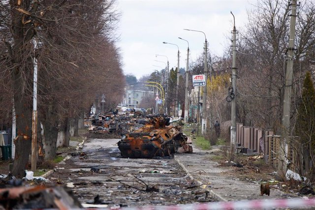 04 April 2022, Ukraine, Bucha: Destroyed Russian tanks litter the streets in Bucha, in the aftermath of the Russian retreat from Irpin and Bucha.