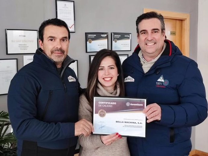 Equipo de Bella Machina con el premio Quality Awards.