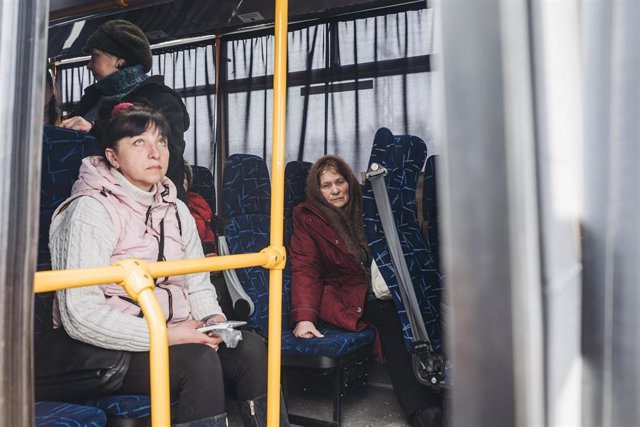 ZAPORIZHZHIA, March 31, 2022  -- Two women wait for evacuation in Zaporizhzhia region, Ukraine, on March 30, 2022.   Ukraine established three humanitarian corridors on Wednesday, Ukrainian Deputy Prime Minister Iryna Vereshchuk said on Telegram.   Two co