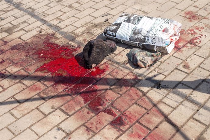 07 April 2022, Ukraine, Kramatorsk: Blood stains are seen next to victims' belongings on the ground following a Russian shelling on the Kramatorsk train station. Photo: Seth Sidney Berry/ZUMA Press Wire/dpa