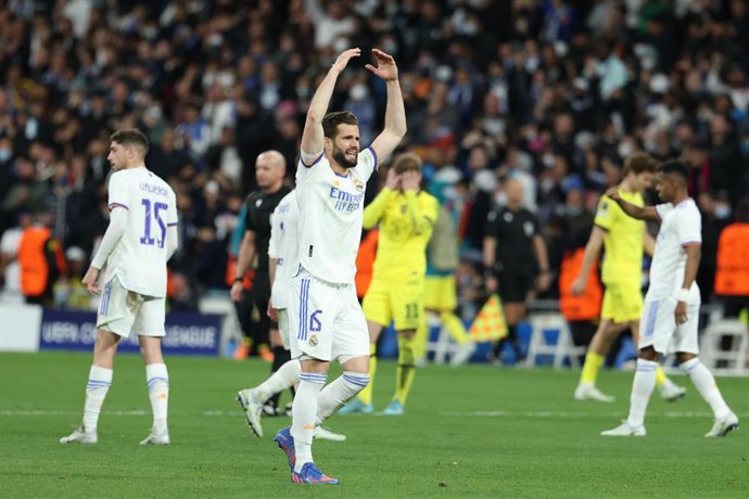 Nacho Fernandez of Real Madrid celebrates a goal scored by Rodrygo Silva De Goes during the spanish league, La Liga Santander, football match played between Real Madrid and Chelsea FC at Santiago Bernabeu stadium on april 12, 2022, in Madrid, Spain.