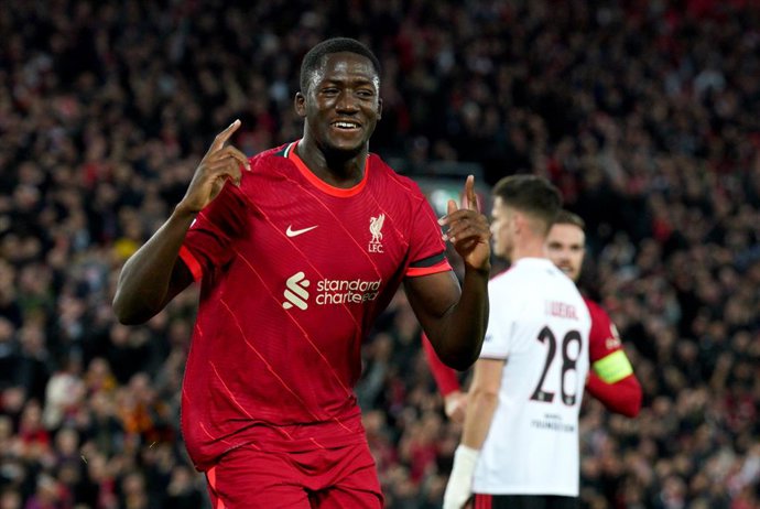 13 April 2022, United Kingdom, Liverpool: Liverpool's Ibrahima Konate celebrates scoring his side's first goal during the UEFA Champions League Quarter-final second leg soccer match between Liverpool FC and SL Benfica at Anfield Stadium. Photo: Peter By