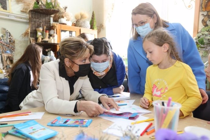 ECW Director Yasmine Sherif meets with children in Moldova.