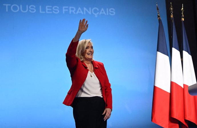 14 April 2022, France, Avignon: Marine Le Pen, presidential candidate of the far-right Rassemblement National (RN) party, waves to her supporters during an election campaign event. France will once again see a run-off presidential election between the c