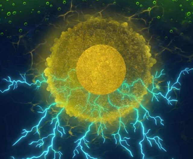 En esta ilustración, el combustible verde (alcohol) está representado por las gotas de color verde en la parte superior de la imagen, que al interactuar con las nanopartículas de oro envueltas en curcumina, producen energía de manera eficiente .