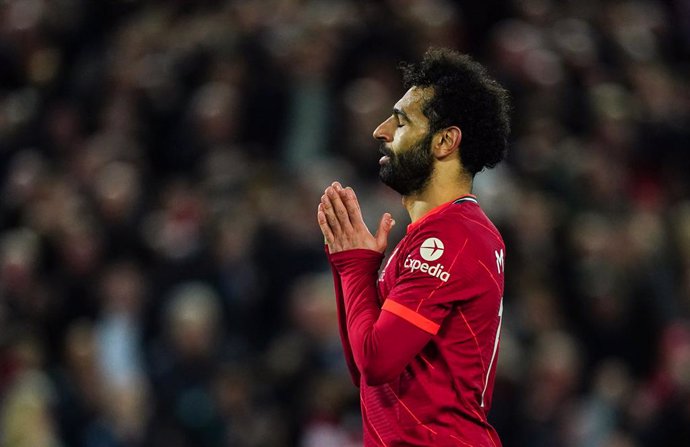 19 April 2022, United Kingdom, Liverpool: Liverpool's Mohamed Salah celebrates scoring his side's fourth goal during the English Premier League soccer match between Liverpool and Manchester United  at the Anfield stadium. Photo: Mike Egerton/PA Wire/dpa