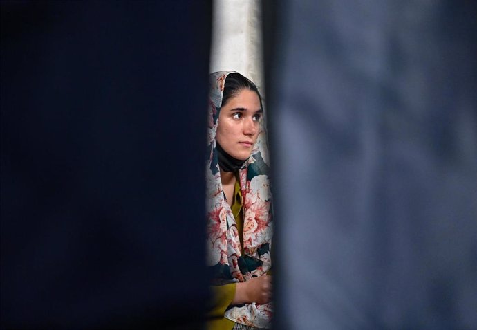 Archivo - Imagen de archivo de una mujer afgana refugiada