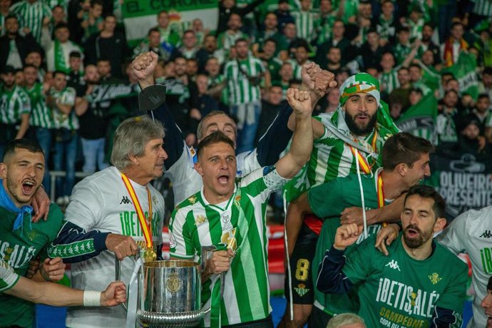 Players of Real Betis celebrate the victory with the Champions trophy winning the Spanish Cup, Copa del Rey, football Final match played between Real Betis Balompie and Valencia CF at Estadio de la Cartuja on April 23, 2022, in Sevilla, Spain
