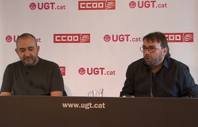 Los secretarios generales de CC.OO. Y UGT de Catalunya, Javier Pacheco y Camil Ros, este lunes en rueda de prensa