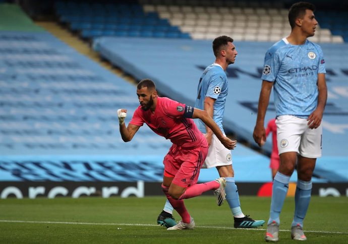 Archivo - 07 August 2020, England, Manchester: Real Madrid's Karim Benzema celebrates scoring his side's first goal during the UEFA Champions League round of 16 second leg soccer match between Manchester City and Real Madrid at the Etihad Stadium. Photo