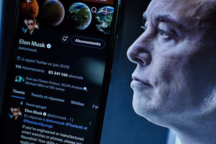 25 April 2022, France, Clermont-Ferrand: A view of entrepreneur Elon Musk Twitter's account displayed on a smartphone screen. Twitter announced on Monday that it has entered into a definitive agreement to be acquired by Tesla founder Elon Musk in a tran