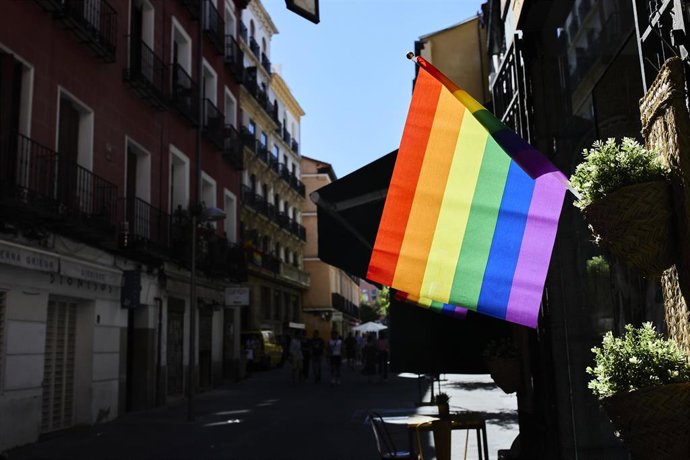 Archivo - Varias balcones con la bandera LGTBI en el barrio de Chueca durante la celebración del Día Internacional del Orgullo LGTBI.