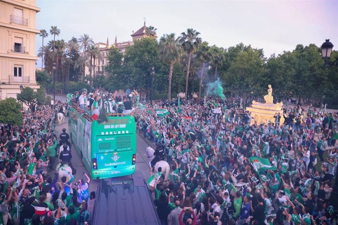 Players of Real Betis during the celebration of Real Betis Balompie as winners of the Spanish Cup, Copa del Rey, with the fans in the streets of Sevilla on April 24, 2022, in Sevilla, Spain.