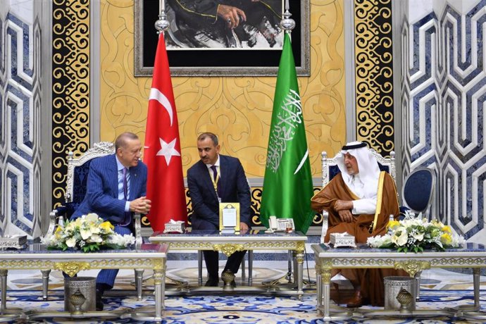 28 April 2022, Saudi Arabia, Jeddah: Governor of Makkah Khalid bin Faisal Al Saud (R) meets with Turkish President Recep Tayyip Erdogan upon his arrival at King Abdulaziz International Airport in Jeddah. Photo: -/Saudi Press Agency/dpa