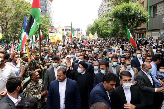 HANDOUT - 29 April 2022, Iran, Tehran: Iranian president takes part in a rally marking Al-Quds Day (Jerusalem Day). Al-Quds Day, the Arabic name for Jerusalem Day, is commemorated in Iran by state-organized rallies, introduced in 1979 by the Iranian rev