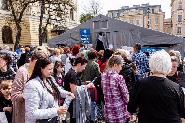 May 4, 2022, Krakow, Poland: Ukrainian refugees queue in front of a tent where they can find clothes at the Main Railway Station in Krakow after escaping war-torn Ukraine. More than 3 million people have already fled Ukraine for Poland. Since the Russian 