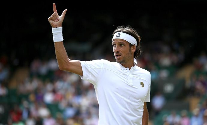 Archivo - El tenista español Feliciano López durante un partido en Wimbledon