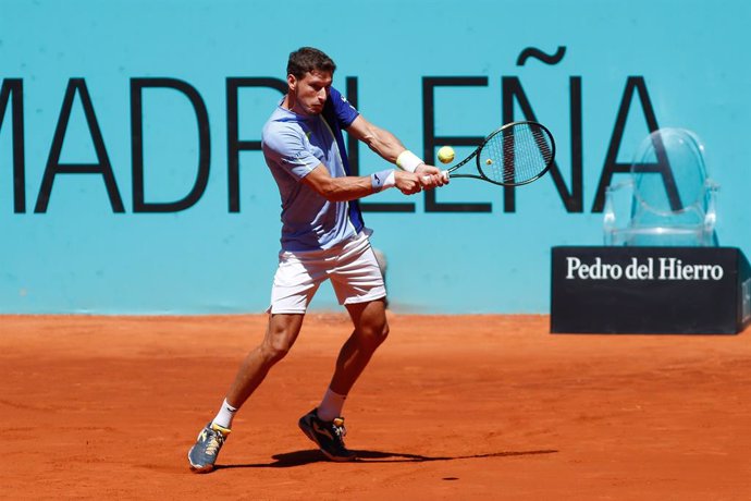 Pablo Carreno Busta and Pedro Martinez of Spain in action against Marcel Granollers of Spain and Horacio Zeballos of Argentina plays dobles during the Mutua Madrid Open 2022 celebrated at La Caja Magica on May 05, 2022, in Madrid, Spain.