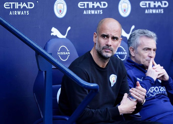 08 May 2022, United Kingdom, Manchester: Manchester City manager Pep Guardiola pictured prior to the start of the English Premier League soccer match between Manchester City and Newcastle United at the Etihad Stadium. Photo: Martin Rickett/PA Wire/dpa
