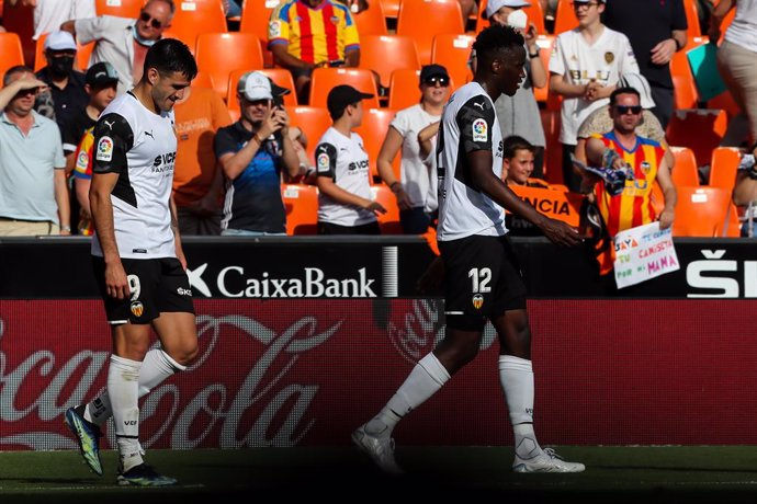 Maxi Gomez of Valencia celebrates an own goal scored by Nestor Araujo of Celta de Vigo during the Santander League match between Valencia CF and RC Celta de Vigo at the Mestalla Stadium on May 21, 2022, in Valencia, Spain.