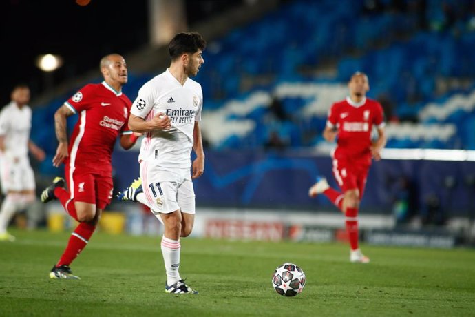 Archivo - Marco Asensio of Real Madrid in action during the UEFA Champions League, Quarter finals round 1, football match played between Real Madrid and Liverpool FC at Alfredo Di Stefano stadium on April 06, 2021 in Valdebebas, Madrid, Spain.