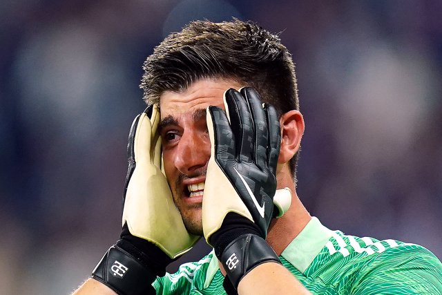 28 May 2022, France, Paris: Real Madrid Goalkeeper Thibaut Courtois celebrates after the UEFA Champions League final soccer match between Liverpool FC and Real Madrid CF at the Stade de France. Photo: Adam Davy/PA Wire/dpa