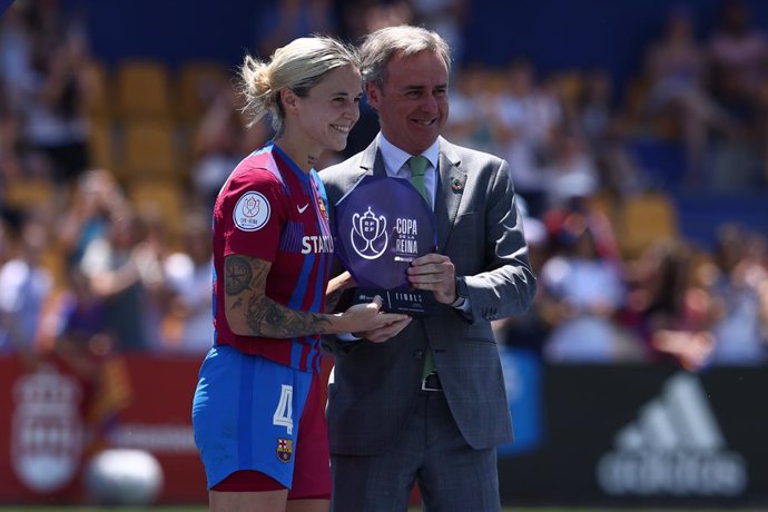 Maria Pilar "Mapi" Leon of FC Barcelona receives the best player trophy during the Final of the spanish women cup, Copa de la Reina, football match played between FC Barcelona and Sporting Club de Huelva on May 29, 2022, in Alcorcon, Madrid Spain.