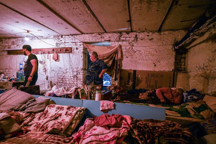 May 30, 2022, Soledar, Ukraine: People seen in a bunker of Soledar. Soledar, a town in the Donetsk region counting about 11,000 inhabitants before the war, it is now deserted, the few civilians still leaving in town are in bunkers. The town is about 5 k