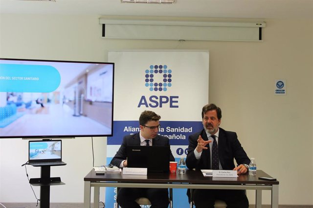 El secretario general, Luis Mendicuti, y el presidente de ASPE,  Carlos Rus.