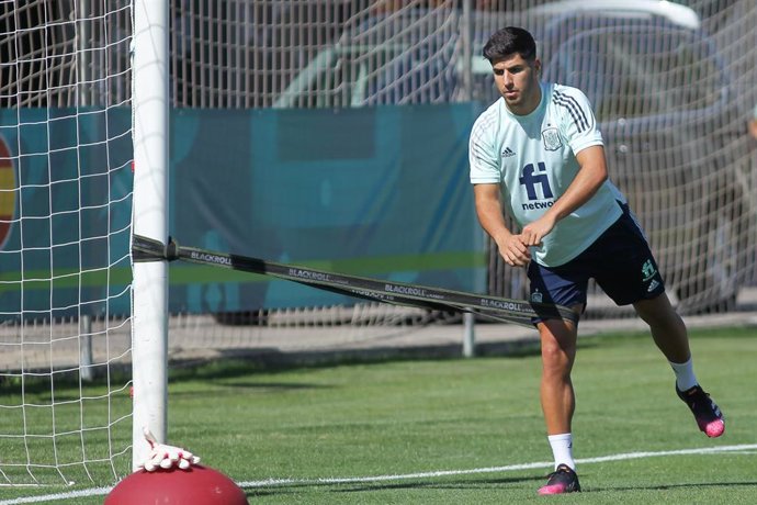 Archivo - El jugador del Real Madrid, Marco Asensio, durante un entrenamiento en La Ciudad del Fútbol de Las Rozas, antes de los Juegos de Tokio que se celebraron en 2021.