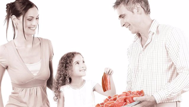 Una familia consume jamón curado