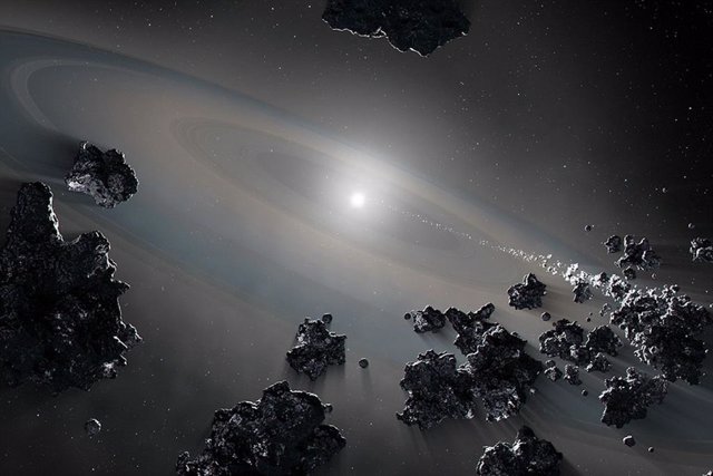 La ilustración del artista muestra una estrella enana blanca extrayendo desechos de objetos destrozados en un sistema planetario.