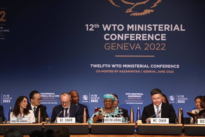 HANDOUT - 17 June 2022, Switzerland, Geneva: Director general of the World Trade Organization Ngozi Okonjo-Iweala (C)attends the conclusion of the 12th Ministerial Conference (MC12) at World Trade Organization (WTO) headquarters in Geneva.