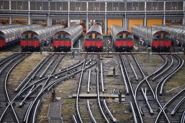 06 June 2022, United Kingdom, London: Piccadilly Line tube trains parked up at a depot near Boston Manor tube station in London, as Members of the Rail, Maritime and Transport union (RMT) are taking industrial action in a dispute over jobs and pensions. P
