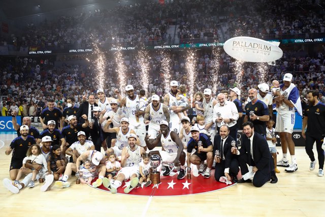 Players of Real Madrid celebrates the victory with the trophy during the Final Game 4 of spanish league, Liga ACB Endesa, basketball match played between Real Madrid and FC Barcelona at Wizink Center pavilion on June 19, 2022, in Madrid Spain.