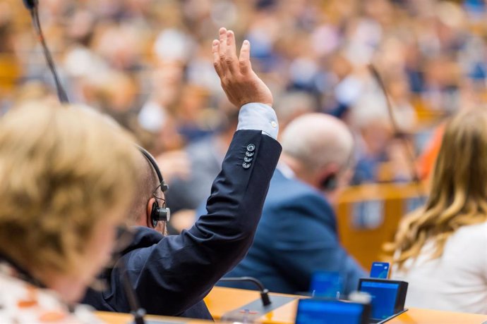 HANDOUT - 22 June 2022, Belgium, Brussels: Members of the European Parliament take part in a voting session during a plenary session at the European Parliament. Photo: Daina Le Lardic/EU Parliament/dpa - ATTENTION: editorial use only and only if the cre