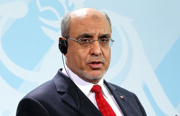 Archivo - FILED - 14 March 2012, Berlin: Hamadi Jebali, then Prime Minister of Tunisia holds a joint press conference with German Chancellor Merkel at the Federal Chancellery. Tunisian police on Thursday arrested former prime minister Jebali. Photo: pic