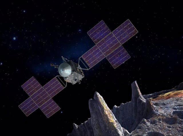 Esta ilustración muestra la nave espacial de la misión Psyche de la NASA cerca del objetivo de la misión, el asteroide Psyche, rico en metales.