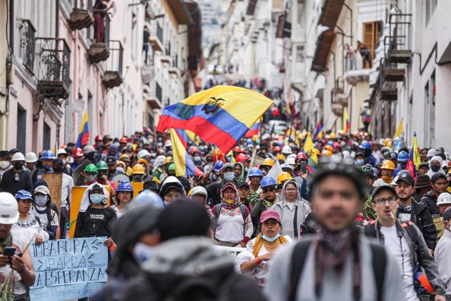 FILED - 27 June 2022, Ecuador, Quito: Indigenous demonstrators protest in the streets of the capital's centre for the 15th consecutive day. The demonstrators are demanding, among other things, a freeze on fuel prices, the deferral of debt service for more