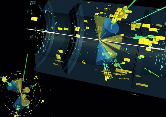 Un Evento De Colisión En El Detector Atlas: Acoplamiento Del Bosón De Higgs Al Quark Top