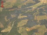 El incendio de Venta del Moro evoluciona favorablemente tras una noche "tranquila" refrescando la zona