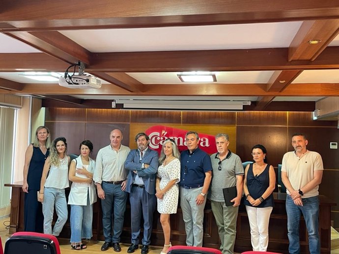 Firma del convenio del textil