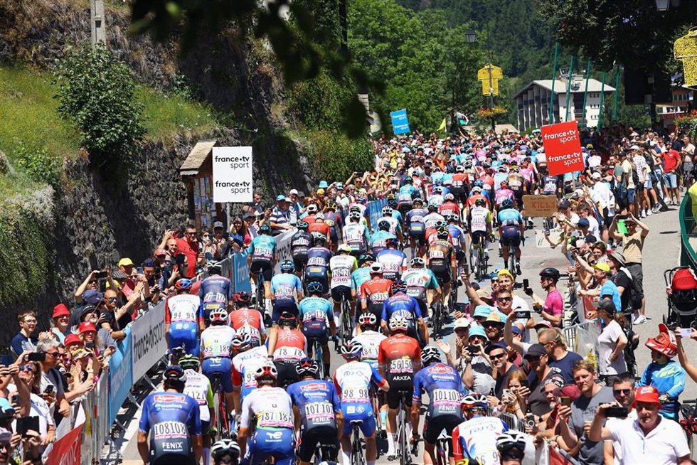 12 July 2022, France, Morzine: The pack rides during the tenth stage of the 109th edition of the Tour de France cycling race, a 148.5-kilometer-long medium-mountain stage from Morzine to Megeve. Photo: David Pintens/BELGA/dpa
