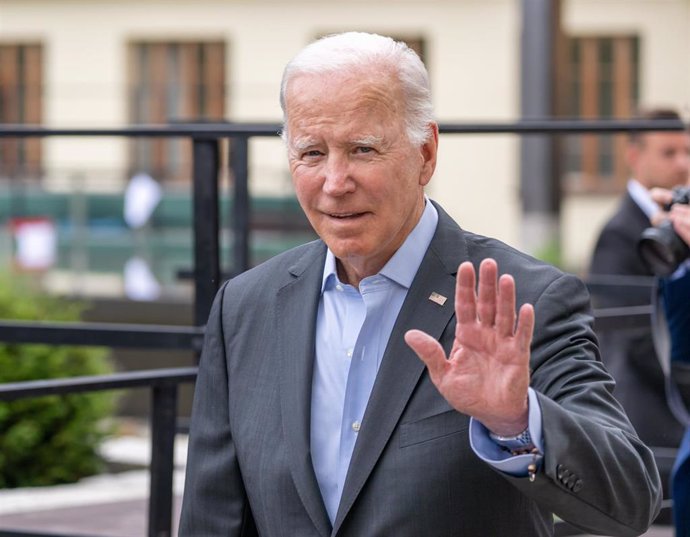 27 June 2022, Bavaria, Elmau: US President Joe Biden walks back after a break from the meeting with outreach states on the sidelines of the 48th G7 Summit. Photo: Peter Kneffel/dpa