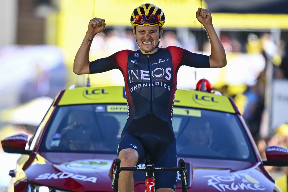 British cyclist Tom Pidcock of the sport for UCI WorldTeam Ineos Grenadiers celebrates at the finish line of the 12th stage of the 109th edition of the Tour de France cycling race, a 165.5-kilometer-long mountain stage from Briancon to Alpe d'Huez