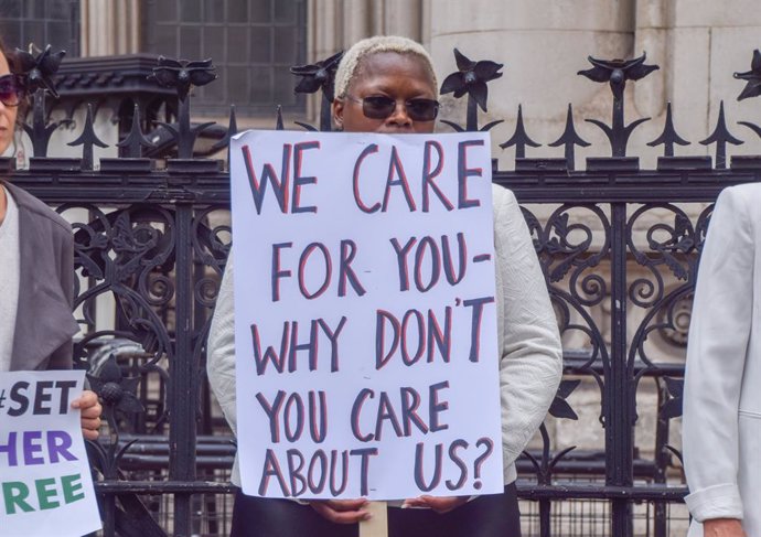 June 28, 2022, London, England, United Kingdom: Protesters gathered outside the Royal Courts Of Justice in support of refugees as the charity Women For Refugee Women (WRW) takes the Home Office to court for detaining women in the new Derwentside immigra